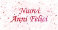 Happy New Year text in Italian Nuovi anni felici turns to dust from bottom on white background