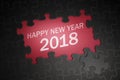 Happy New Year 2018 text on jigsaw puzzle