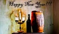 Happy new year toasting with some excellent red wine in the cellar Royalty Free Stock Photo