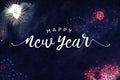 Happy New Year Typography with Fireworks in Night Sky Royalty Free Stock Photo
