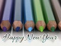 Happy New Year 2025 Typography And Calligraphy Text On Beautiful Colorful Pencil And White Background.