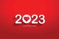 Happy new year 2023 white numbers paper cut style on a red background.
