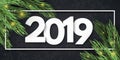 Happy New Year 2019. White paper cut numbers. Christmas tree and abstract golden lights. Festive web banner. Pattern of snowflakes