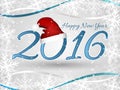 Happy New Year wishes or greeting card with Santa hat, ribbons and frame from snowflakes. Royalty Free Stock Photo