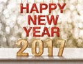 Happy New Year 2017 wood texture on marble table with sparkling Royalty Free Stock Photo