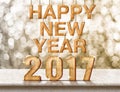 Happy New Year 2017 wood texture on marble table with sparkling Royalty Free Stock Photo