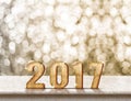 Happy New Year 2017 wood texture on marble table with sparkling Royalty Free Stock Photo