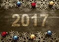 Happy New Year 2017 on a wooden background. Number 2017 on vintage style