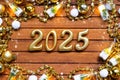 Happy New Year wooden numbers 2025 on cozy festive brown wooden background with sequins, snow, lights of garlands. Greetings,