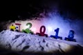 2018 happy new year,wooden toy train carrying numbers of 2018 year on snow. Toy train with 2018. Copy space. Christmas decoration.