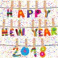 Happy new year 2018 word hanging in clothes pegs on rope Royalty Free Stock Photo