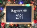 happy new year 2021 writing on a slate