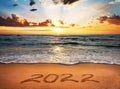 Happy New Year 2022! Written 2022 on the beach