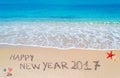 Happy new year 2017 written on the beach Royalty Free Stock Photo