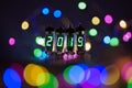 Happy new year is written with a lamp light. Radio electronic lamps. 2019. Original designed congratulation with a