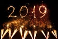 Happy new year 2019 written with Sparkle firework on black background, Royalty Free Stock Photo
