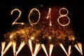 Happy new year 2018 written with Sparkle firework on black background, Royalty Free Stock Photo