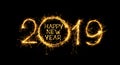 Happy New Year 2019 written sparklers on black background Royalty Free Stock Photo