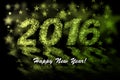 Happy New Year 2016. Yellow and green stars background with bokeh effect Royalty Free Stock Photo