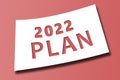 Happy New Year 2022. New year, new you, start, goals. Conceptual motivational message written with red numbers on white paper.