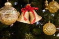 Happy new years gold ball and two bell golden balls with bow Cristmas tree