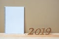 2019 Happy New years with notebook and wooden number on table and copy space. New Start, Resolution, Goals and Mission Royalty Free Stock Photo