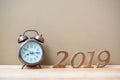 2019 Happy New years with retro alarm clock and wooden number on table and copy space. New Start, Resolution, Goals and Mission Royalty Free Stock Photo