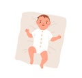 Happy newborn baby in bodysuit. Top view of smiling joyful infant in clothes. Adorable little boy lying on pillow. New