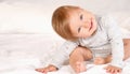 Happy newborn baby smiling and looking at camera Royalty Free Stock Photo