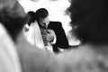 Happy newlywed bride and groom dancing at wedding reception closeup b&w Royalty Free Stock Photo