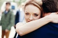 Happy newlywed bride hugging groom after wedding ceremony outdoors face close-up, newlywed couple portrait Royalty Free Stock Photo