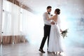 Happy newlywed couple dancing in festive hall Royalty Free Stock Photo