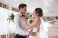 Happy newlywed couple dancing in festive hall Royalty Free Stock Photo