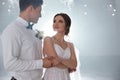 Happy newlywed couple dancing in festive hall Royalty Free Stock Photo