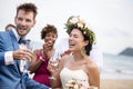 Happy newlyweds at beach wedding