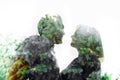 Man and woman close-up against the background of a rock. Multiple exposure