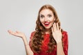 Happy nice woman with french manicured nails and open palm hand on white background