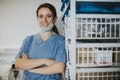 Happy nurse in a medical supplies room Royalty Free Stock Photo