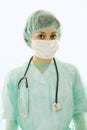 Happy nurse with stethoscope isolated on white Royalty Free Stock Photo