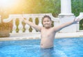 Happy obese fat boy in swimming pool, Royalty Free Stock Photo