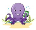 The happy octopus is holding the new smart phone with the tentacle Print