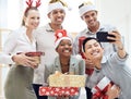 Happy, office and christmas party selfie of a corporate event with diversity staff on a phone. Business worker, friends Royalty Free Stock Photo