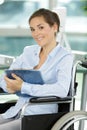 Happy office worker in wheelchair Royalty Free Stock Photo
