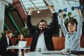 Happy Office Workers Working with Dumbbells Royalty Free Stock Photo