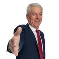 Happy old businessman ready to shake hands Royalty Free Stock Photo