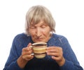 Happy old lady with coffee Royalty Free Stock Photo