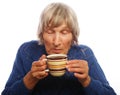 Happy old lady with coffee Royalty Free Stock Photo