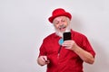 Happy old man using smartphone for e-commerce Royalty Free Stock Photo