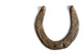 Happy old rusty horseshoe brings good luck on white background, isolate. Royalty Free Stock Photo