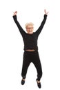 Happy old woman jumping. Royalty Free Stock Photo